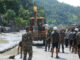 भोटेकोशी बाढी : १,३४१ जनाको शव फेला, अझै करिब ५ हजार बेपत्ता Security personnel and rescue workers clear flood debris during Bhotekoshi flood relief operations in Nepal