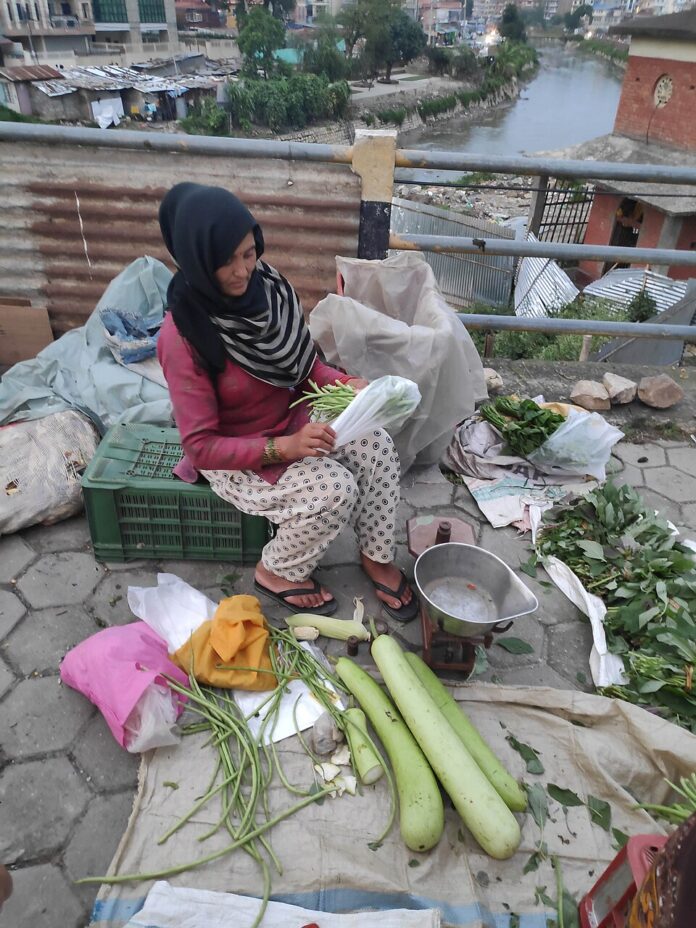नेपालमा तरकारी बिक्री — फाइल तस्बिर नेपालमा तरकारी बिक्री गर्दै गरेकी विक्रेता